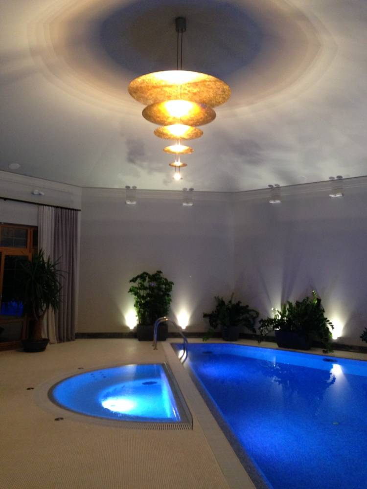 Wall covering: SICIS mosaic, lighting by Cattelani & Smith